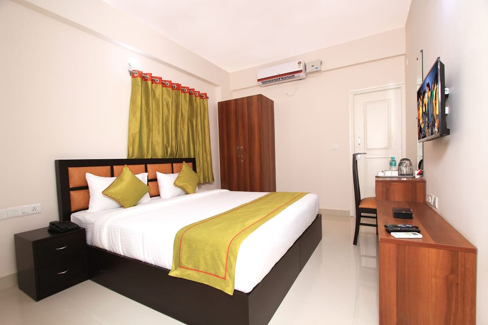 Deluxe Room, Accessible, Hill View | In-room safe, desk, soundproofing, iron/ironing board