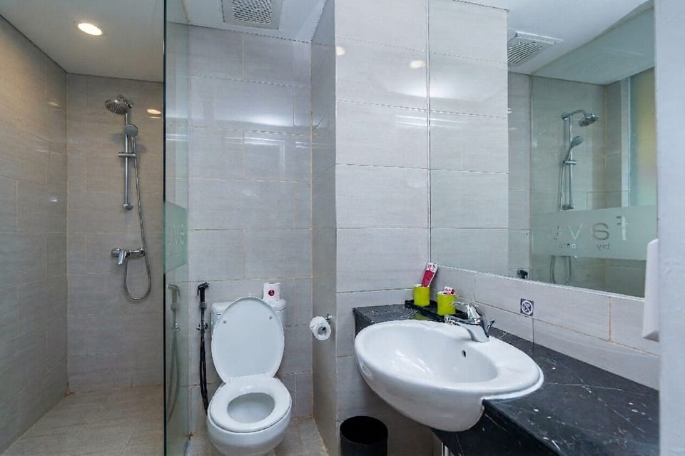 Shower, free toiletries, slippers, towels