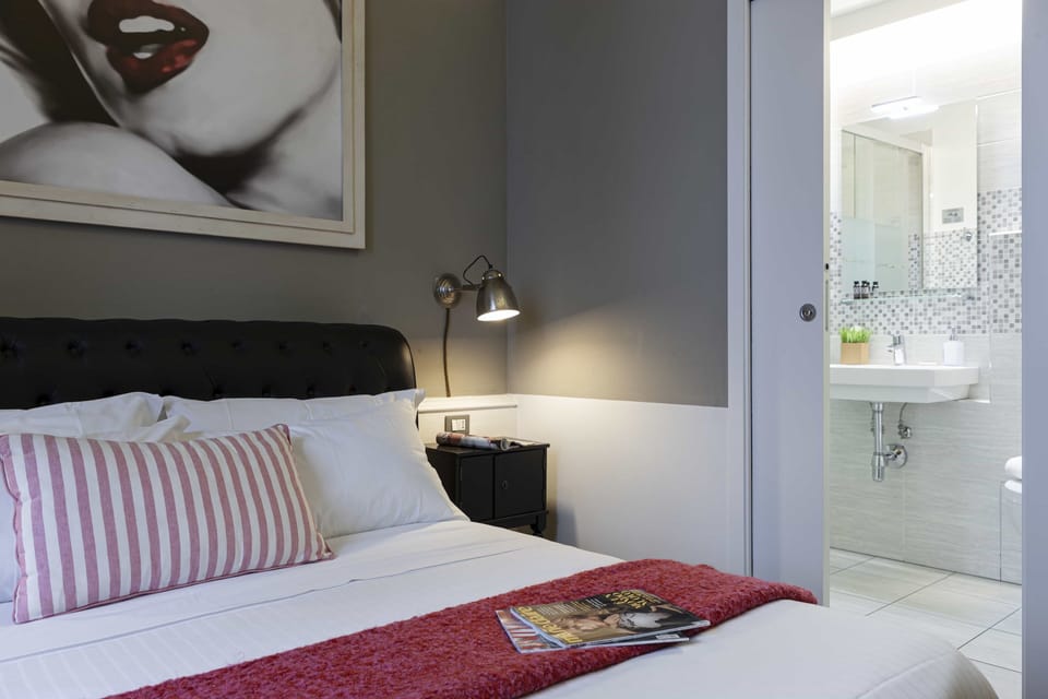 Room | Premium bedding, down comforters, memory foam beds, minibar