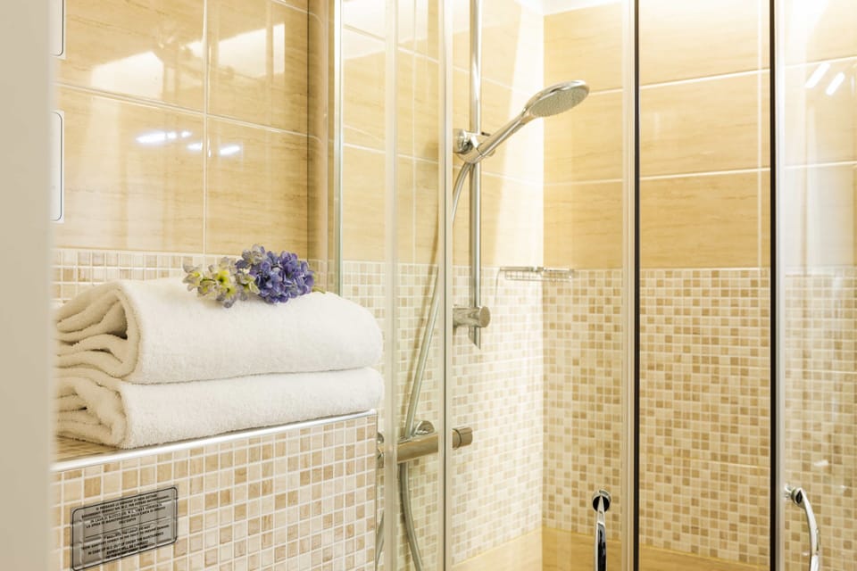 Room | Bathroom | Shower, rainfall showerhead, designer toiletries, hair dryer