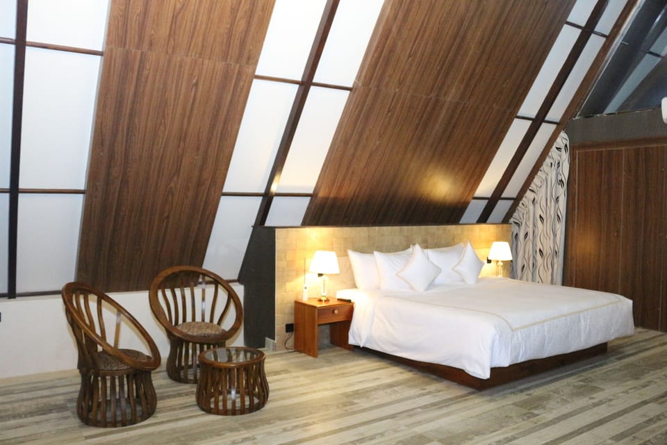 Superior Chalet, Lake View | Premium bedding, minibar, in-room safe, blackout drapes