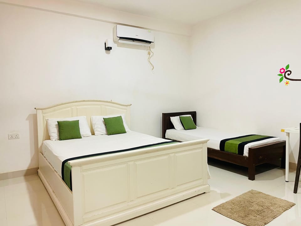 Standard Triple Room, Multiple Beds, Garden View | Premium bedding, desk, laptop workspace, iron/ironing board