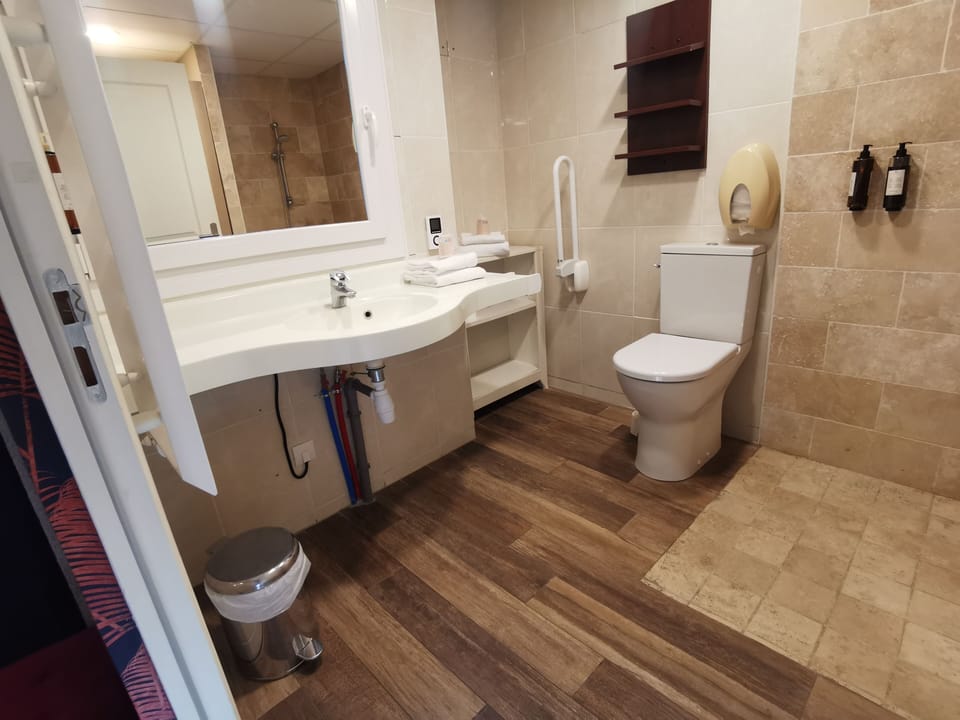Shower, free toiletries, hair dryer (on request), towels