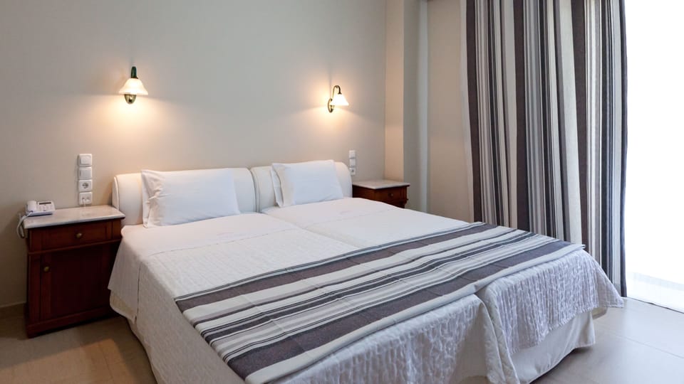 Hypo-allergenic bedding, memory foam beds, minibar, in-room safe