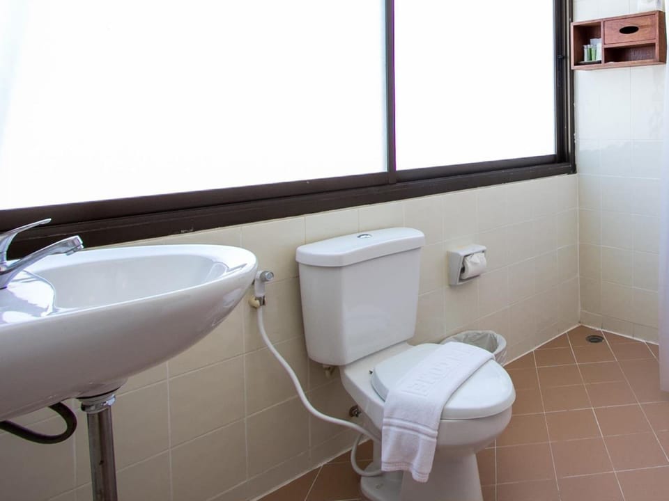 Family Superior Two Double Bed | Bathroom | Shower, free toiletries, hair dryer (on request), towels