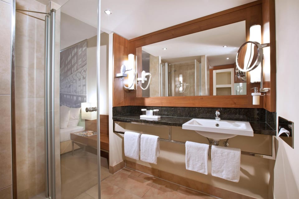 Shower, eco-friendly toiletries, hair dryer, bathrobes