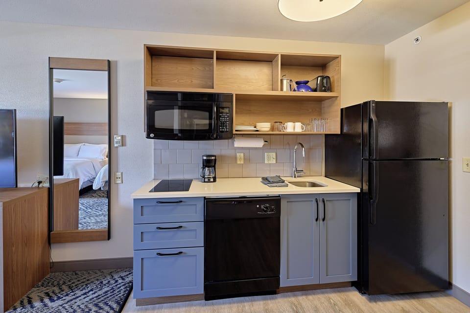 Studio Suite, 2 Double Beds | Private kitchen | Coffee/tea maker, full-size fridge, microwave, stovetop