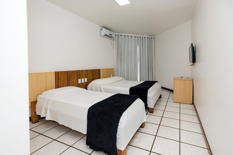 Standard Triple Room | Minibar, desk, blackout drapes, free WiFi