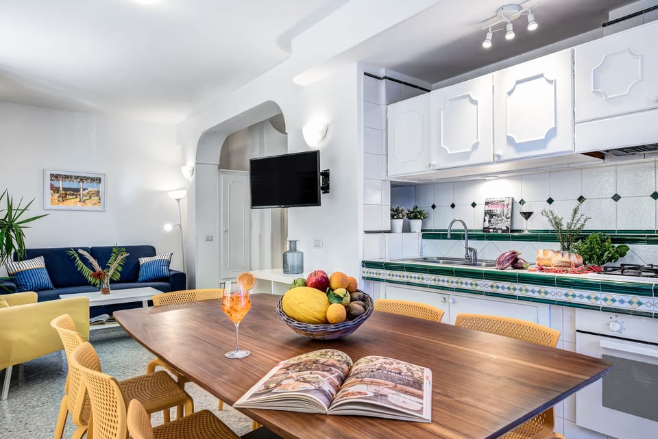 Deluxe Apartment, 3 Bedrooms, Balcony, Sea View | Living area | 32-inch TV with satellite channels