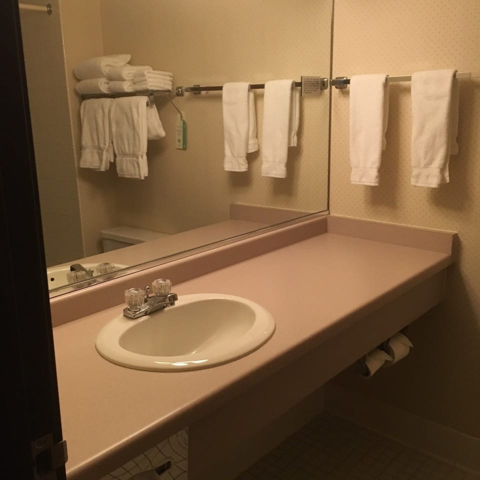 Two Double Queen Deluxe | Bathroom | Combined shower/tub, free toiletries, hair dryer (on request), towels