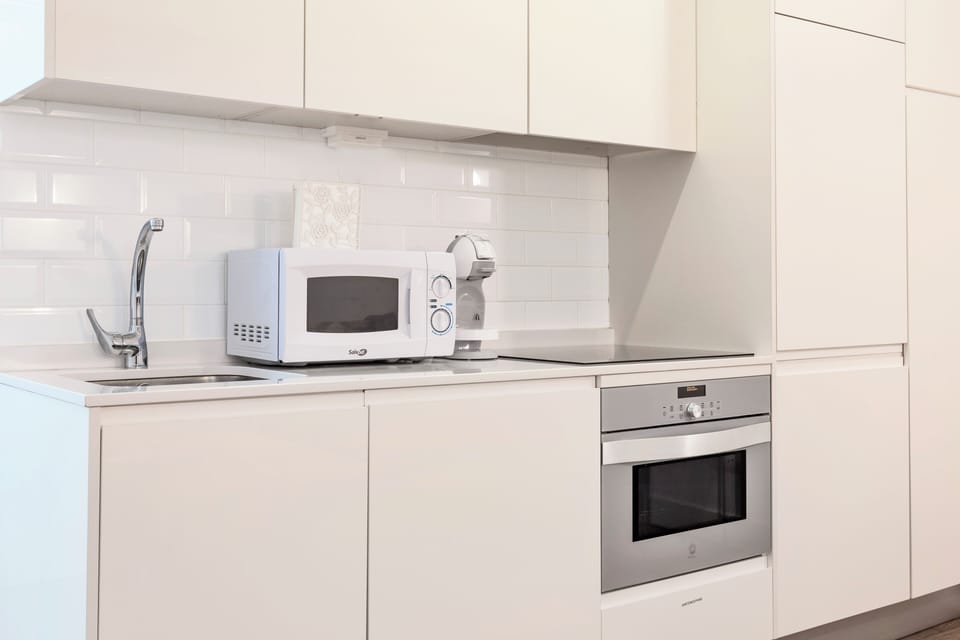 Deluxe Apartment, 1 Bedroom | Private kitchen | Fridge, microwave, oven, dishwasher