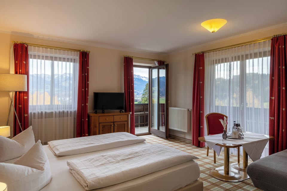 Family Triple Room | Minibar (free items), in-room safe, WiFi (free), bed sheets