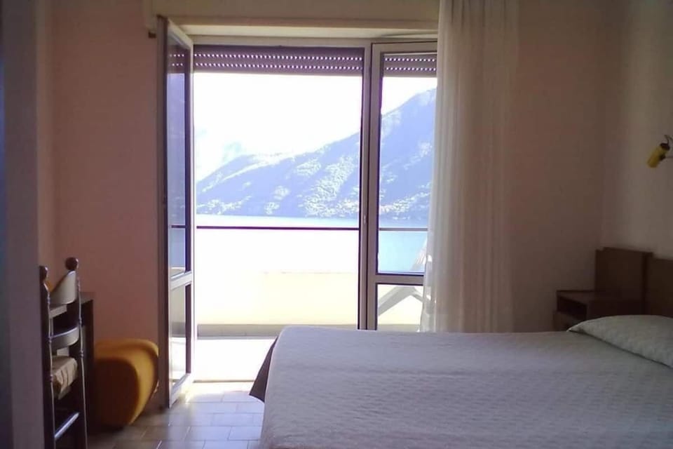 Double or Twin Room, Air conditioning, Lake View | Down comforters, in-room safe, desk, soundproofing