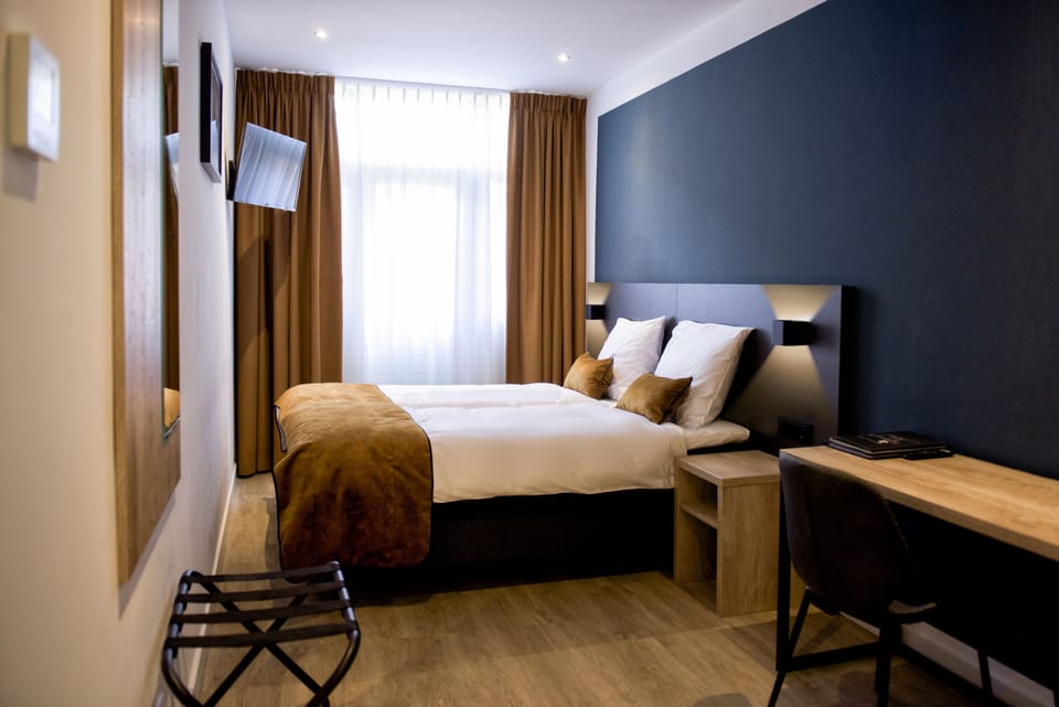 In-room safe, desk, laptop workspace, iron/ironing board