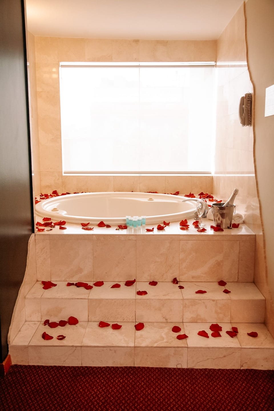 Deluxe Suite, 1 Queen Bed | Bathroom | Combined shower/tub, hair dryer, towels