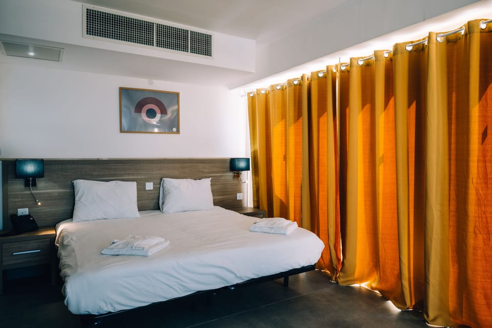 Double or Twin Room, Balcony, City View | Iron/ironing board, free cribs/infant beds, wheelchair access