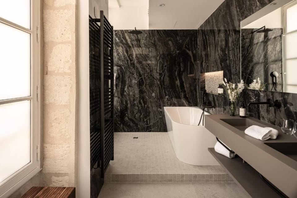 Superior Double Room, Garden View | Bathroom | Separate tub and shower, rainfall showerhead, designer toiletries