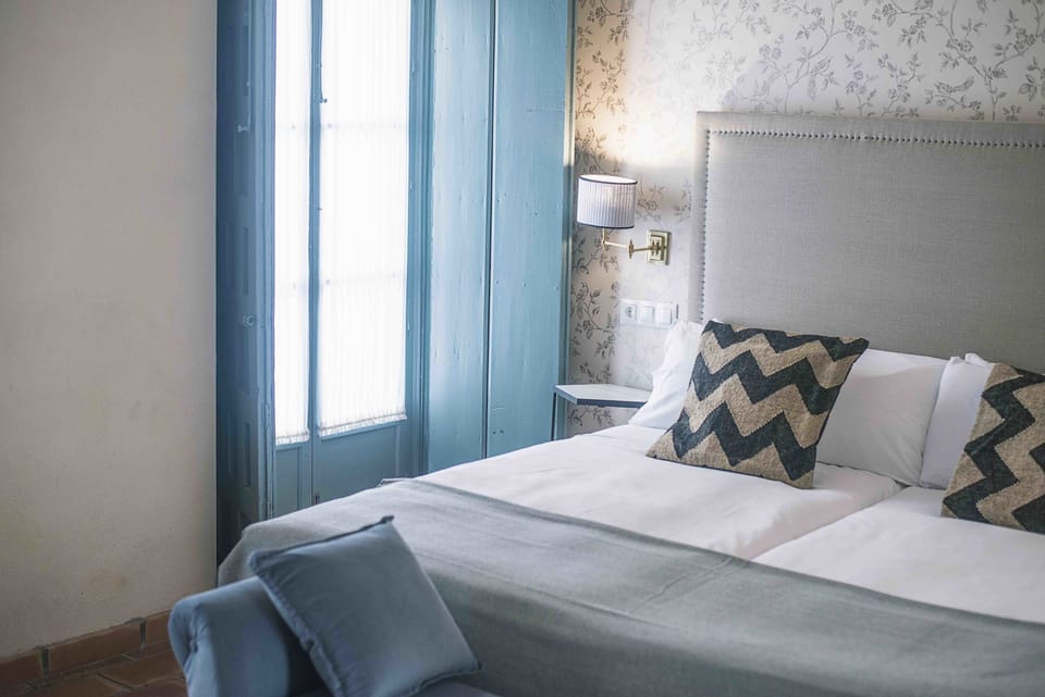 Deluxe Double Room, Balcony | Blackout drapes, iron/ironing board, free WiFi