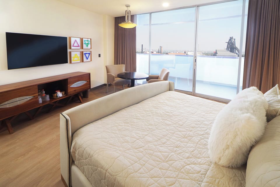 Suite, 1 Bedroom (Dining) | Down comforters, in-room safe, desk, blackout drapes