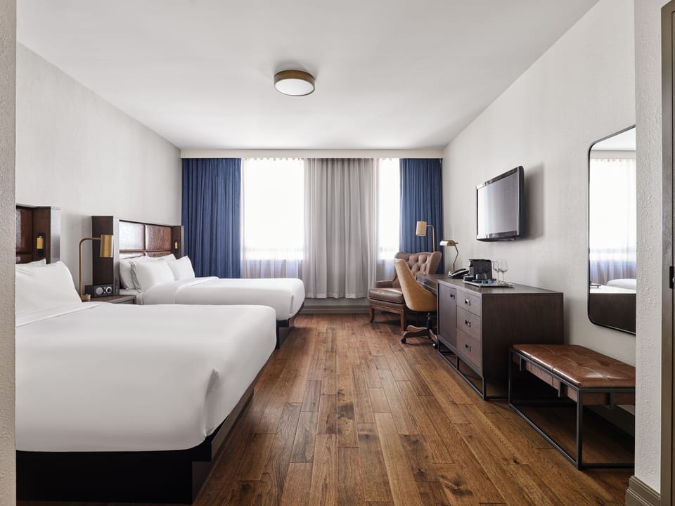 Premium bedding, down comforters, pillowtop beds, minibar