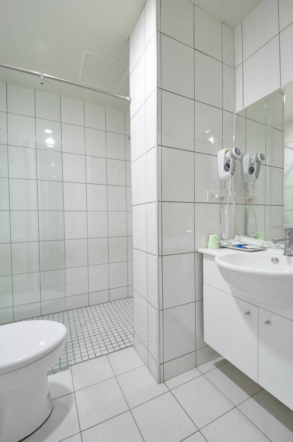 Shower, free toiletries, hair dryer, slippers