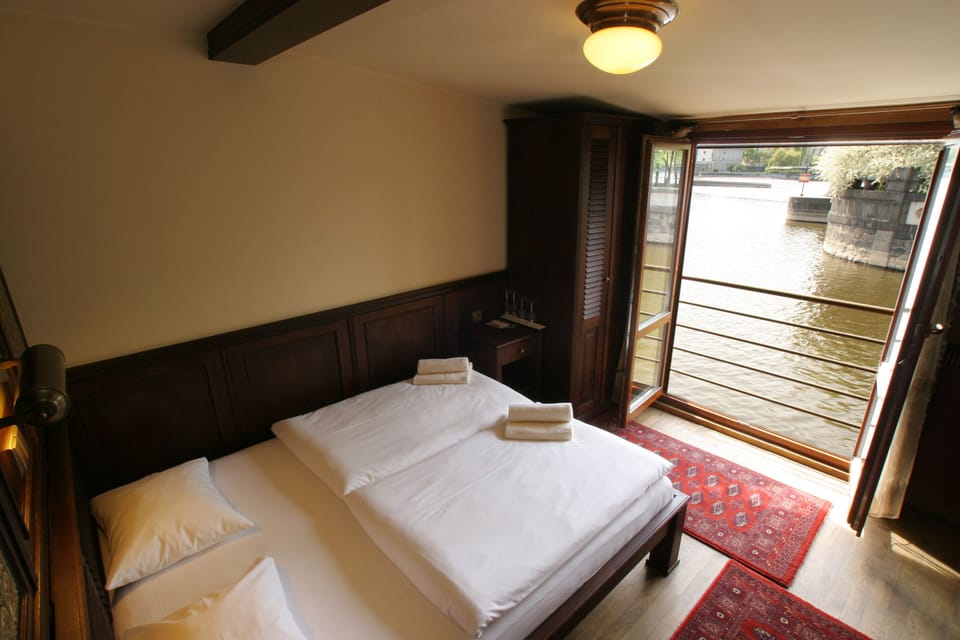 Superior Double Room, River View | Minibar, blackout drapes, iron/ironing board (on request), cribs (free)