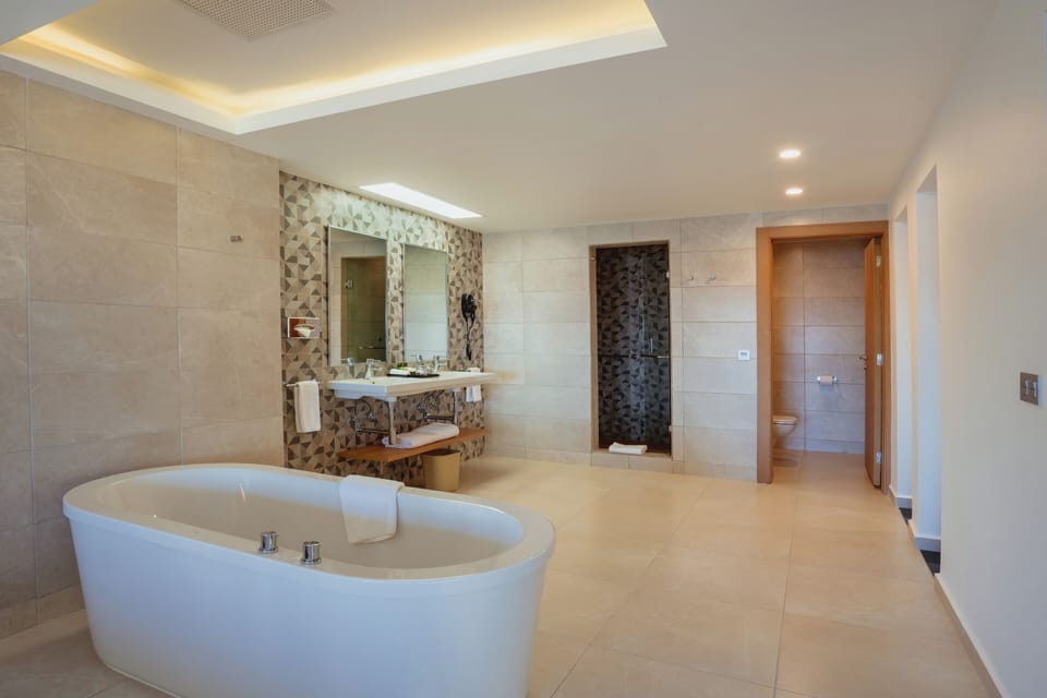 Shower, eco-friendly toiletries, hair dryer, towels