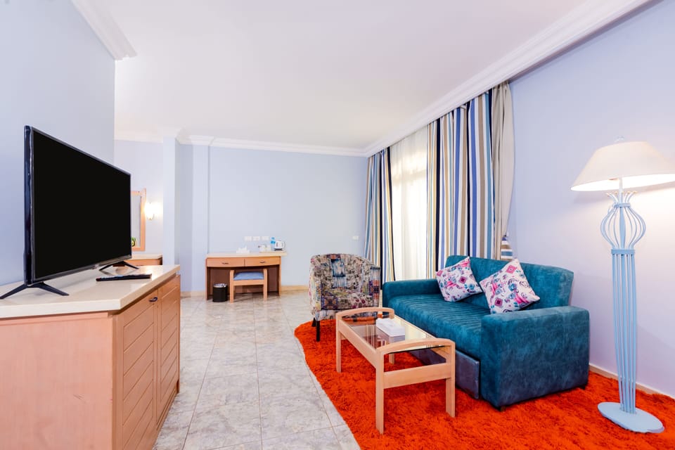 Junior Double Room | Living area | LCD TV, table tennis