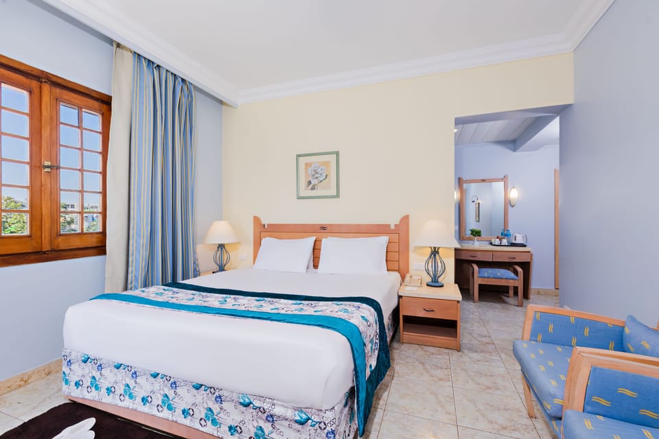 Standard Double with Pool View | Premium bedding, in-room safe, rollaway beds