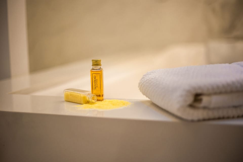 Suite Imperial | Bathroom | Designer toiletries, hair dryer, bathrobes, slippers