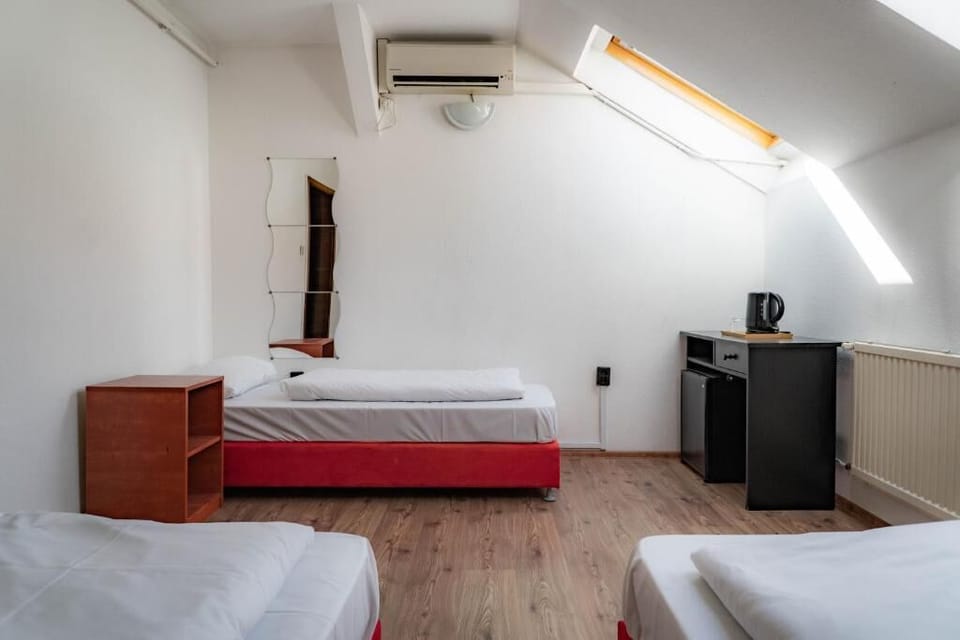 Standard Triple Room, 3 Twin Beds | Hypo-allergenic bedding, blackout drapes, free WiFi