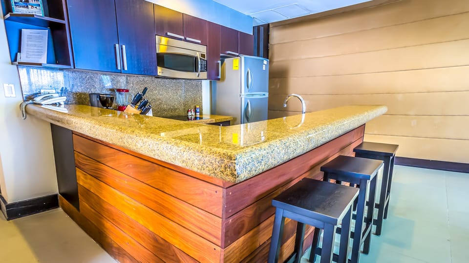 Panoramic Penthouse | Private kitchen | Fridge, stovetop, coffee/tea maker, toaster