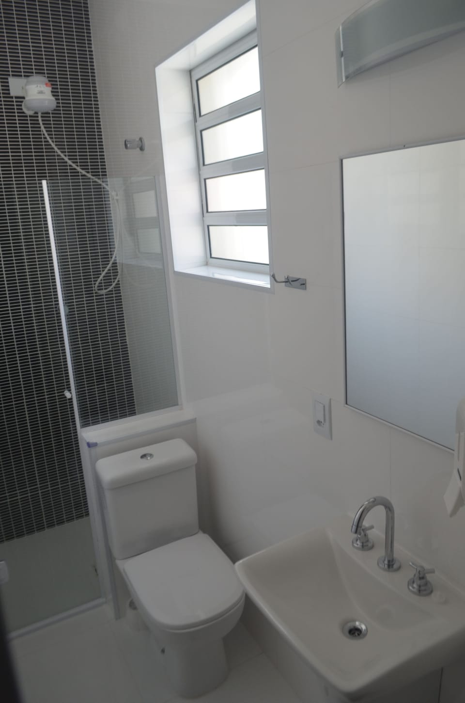 Basic Single Room (no window - black) | Bathroom | Shower, towels