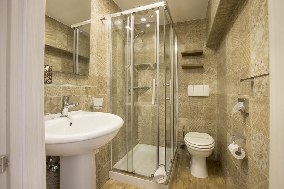 Family Quadruple Room, 1 Bedroom | Bathroom | Shower, free toiletries, hair dryer, bidet