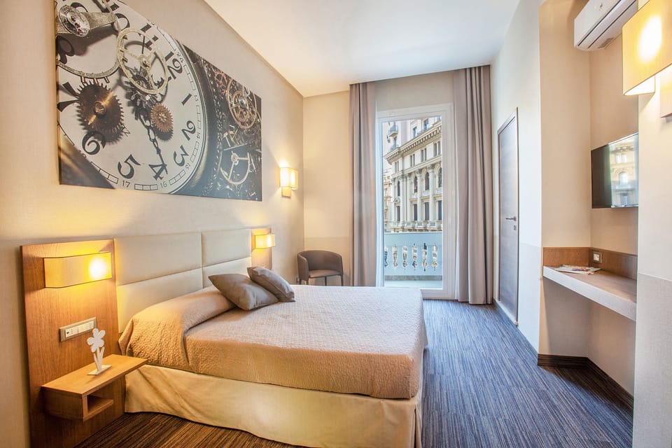 Deluxe Double Room, 1 Bedroom, Balcony | Down comforters, minibar, in-room safe, desk