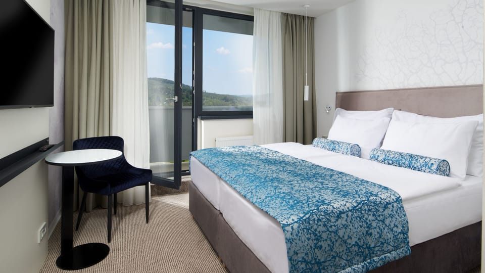 Deluxe Double or Twin Room (Unlimited Spa Access) | In-room safe, desk, laptop workspace, blackout drapes