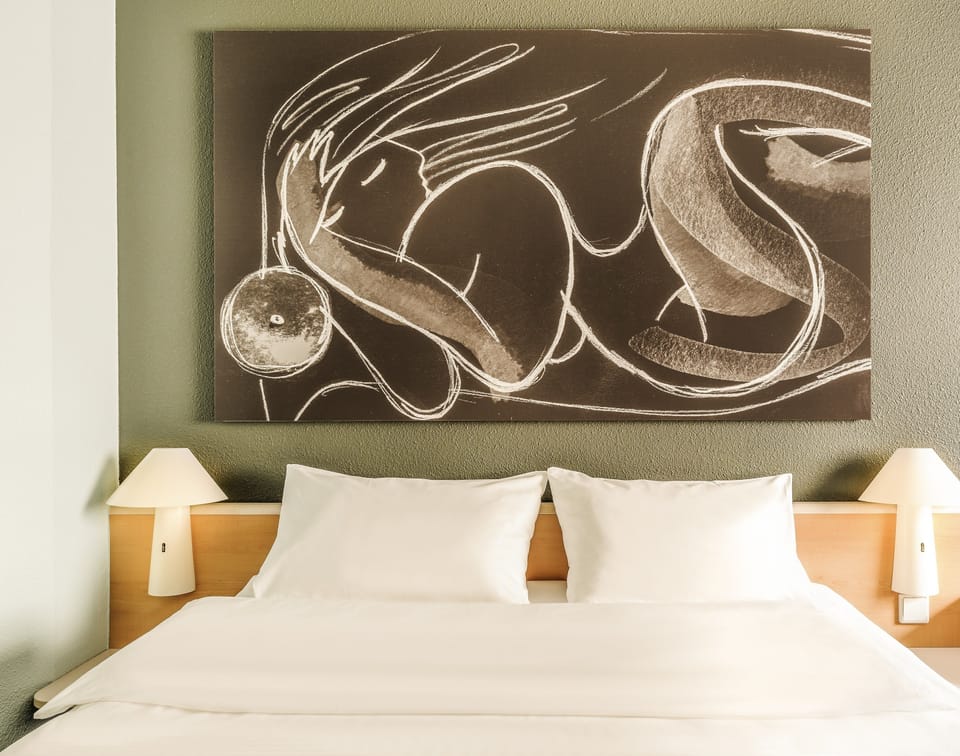 Premium bedding, desk, laptop workspace, soundproofing