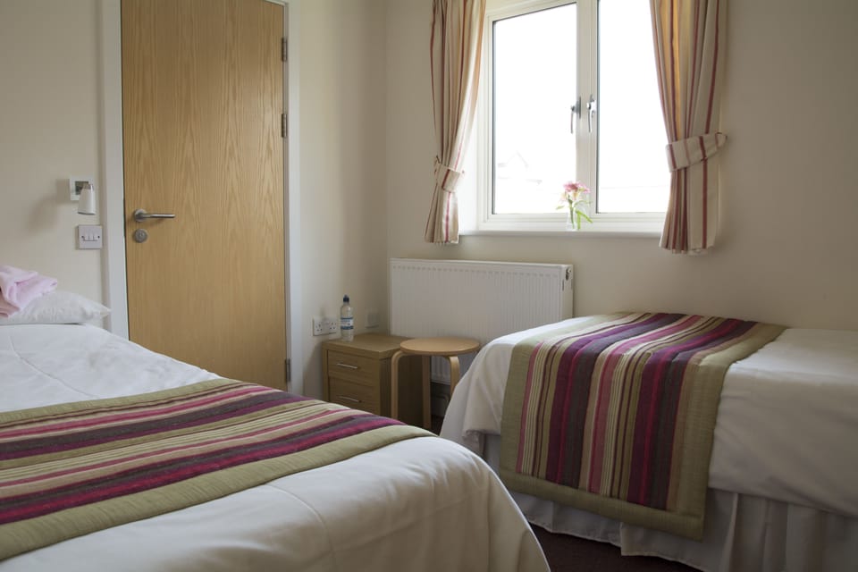 Twin Room | Laptop workspace, iron/ironing board, free WiFi, bed sheets