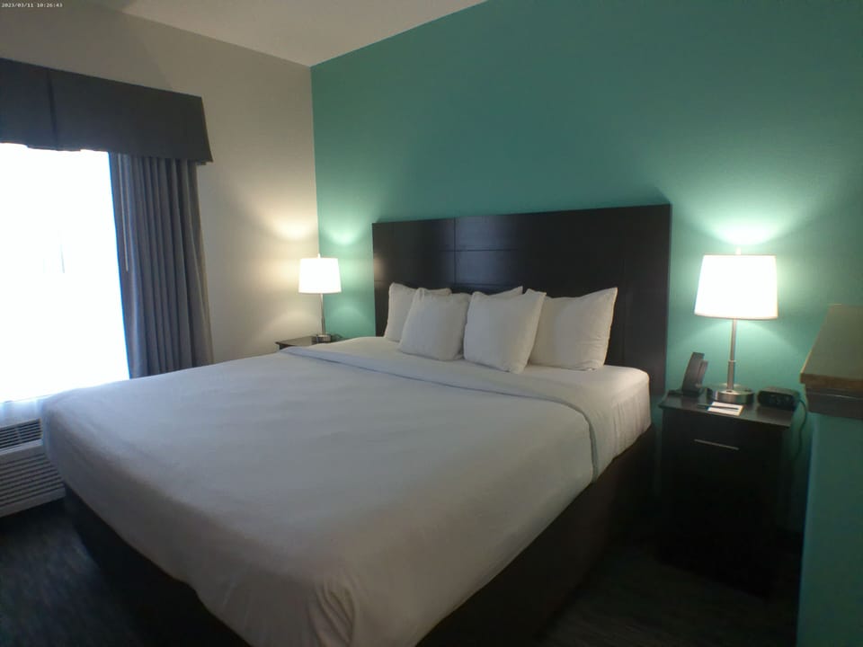 Desk, blackout drapes, iron/ironing board, WiFi (free)