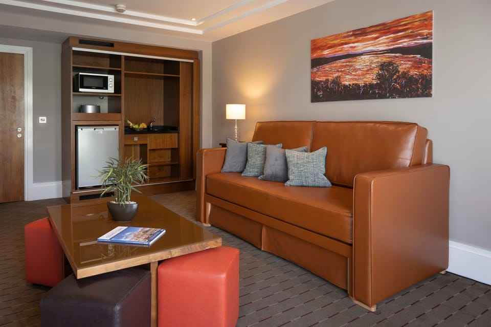 Suite, 1 Bedroom | In-room safe, desk, iron/ironing board, WiFi (free)