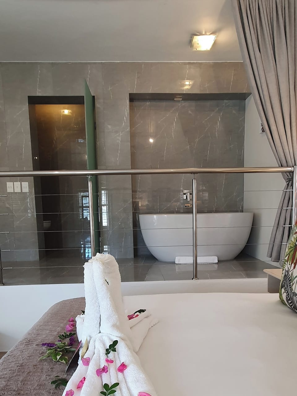 Premier Suite | Bathroom | Designer toiletries, hair dryer, bathrobes, towels