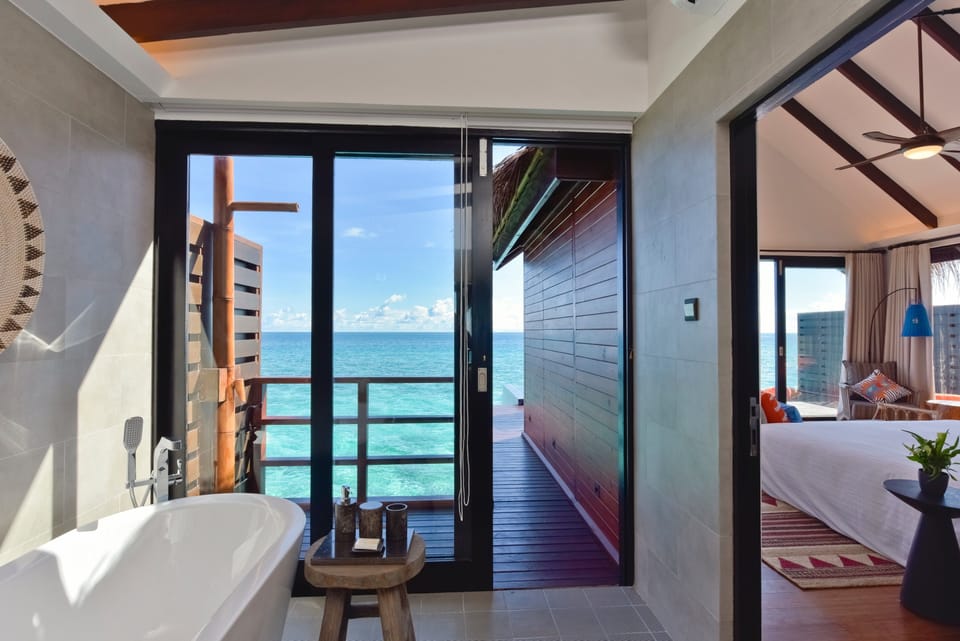 Pool Water Villa | Bathroom | Separate tub and shower, deep soaking tub, free toiletries, hair dryer