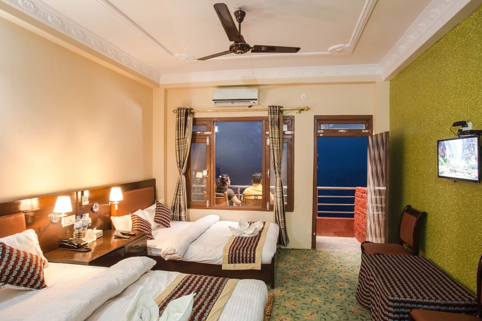 Corporate Deluxe Room | Iron/ironing board, free WiFi