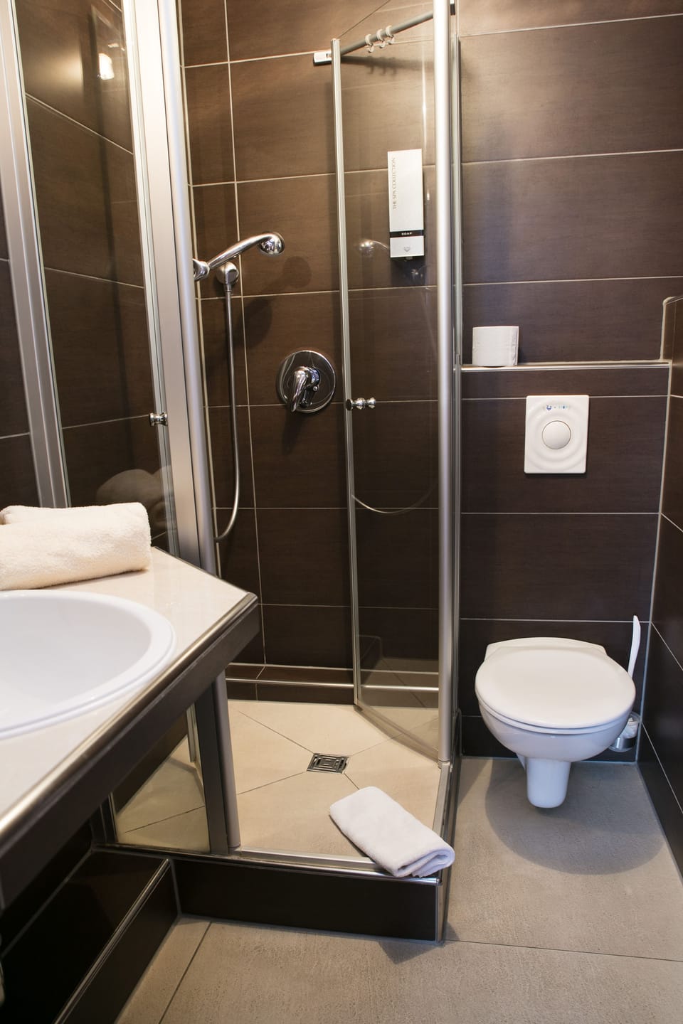 Shower, free toiletries, hair dryer, towels