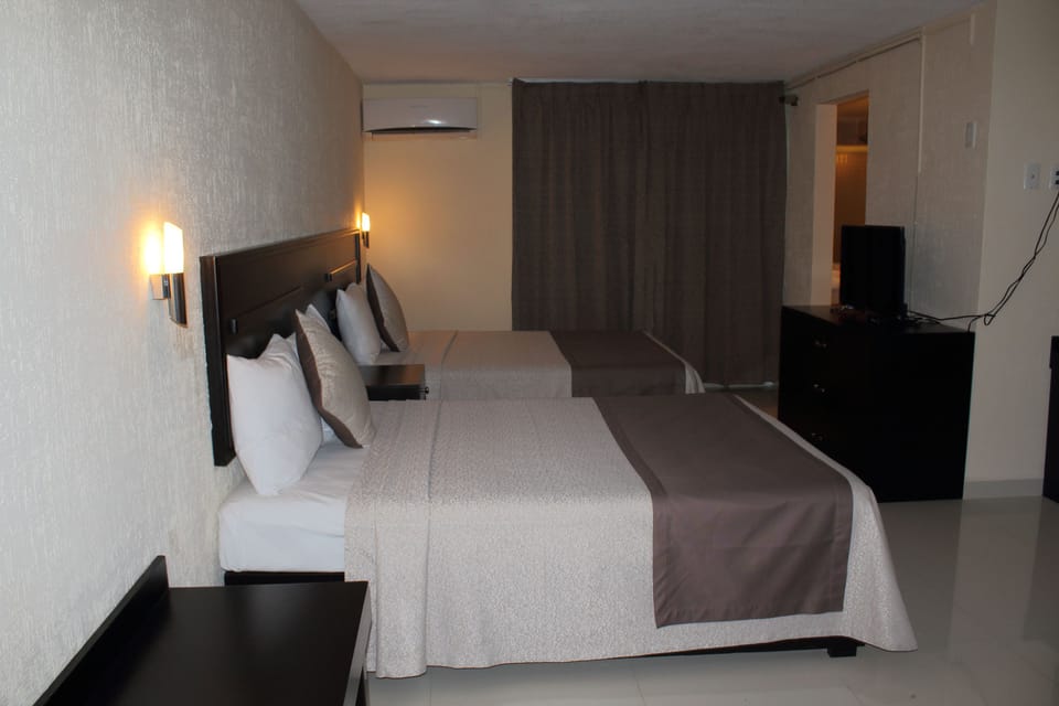 Family Suite, 2 Double Beds | In-room safe, desk, iron/ironing board, WiFi (free)