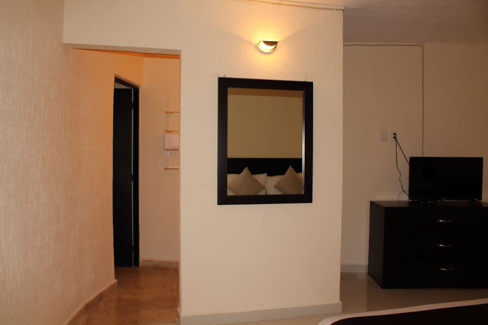 Standard Suite, 1 King Bed | In-room safe, desk, iron/ironing board, WiFi (free)