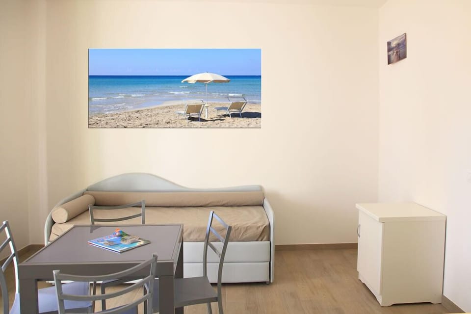 Family Suite, 2 Bedrooms, Balcony | Living area | Flat-screen TV