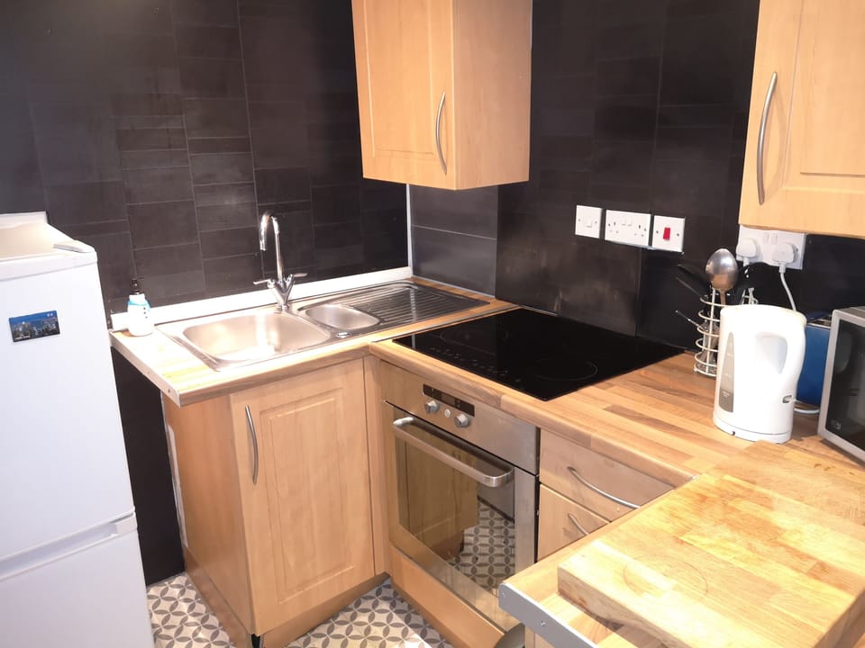Apartment | Private kitchen | Fridge, microwave, stovetop, coffee/tea maker