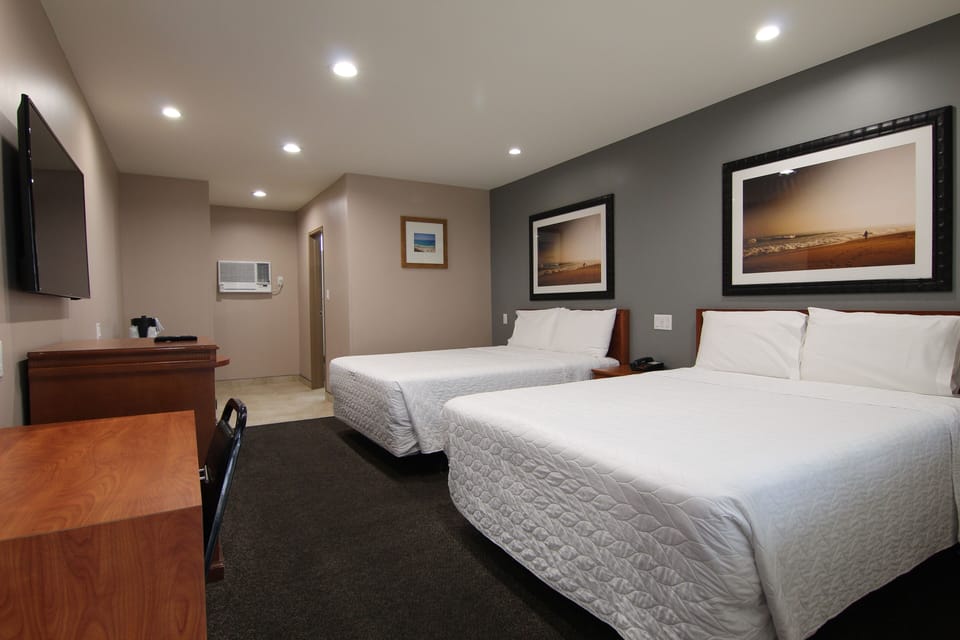Standard Room, 2 Queen Beds | Iron/ironing board, free WiFi, bed sheets