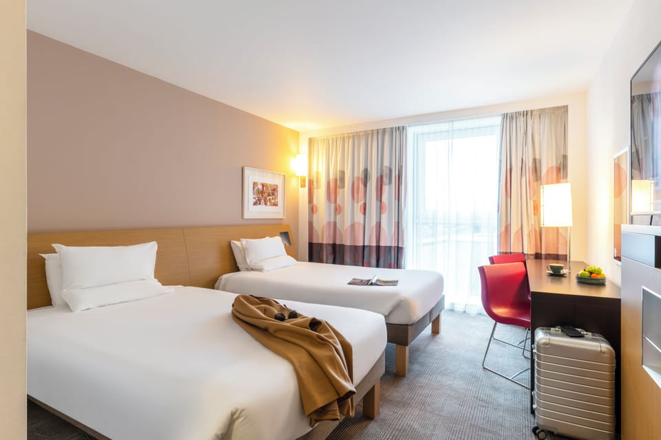Superior Room, 2 Twin Beds | Minibar, in-room safe, desk, laptop workspace